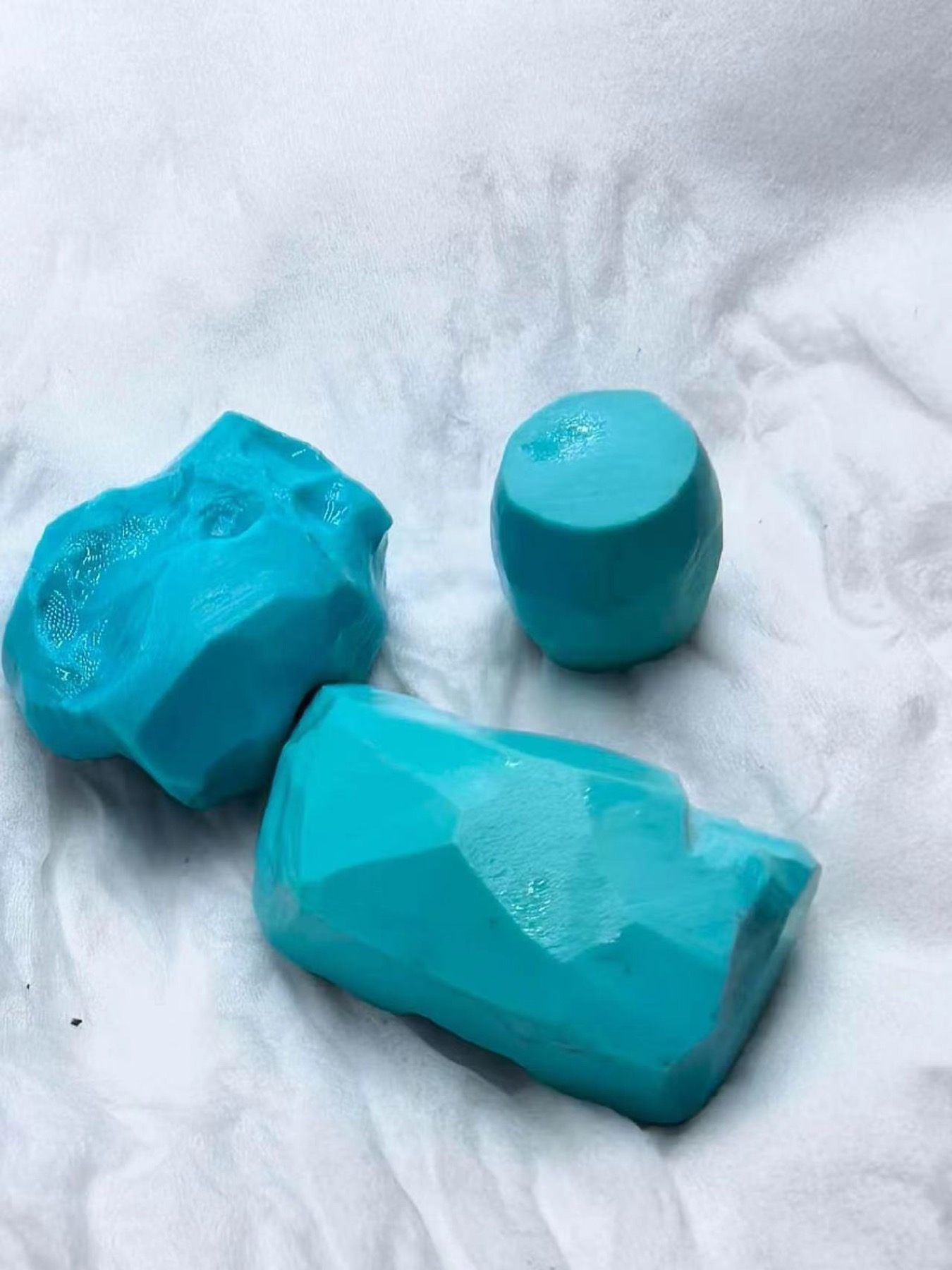 Three pieces of turquoise rough with most exterior host rock removed